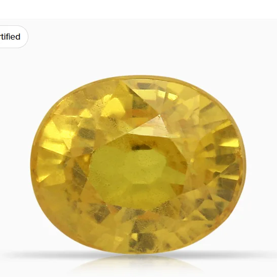 An oval natural yellow sapphire