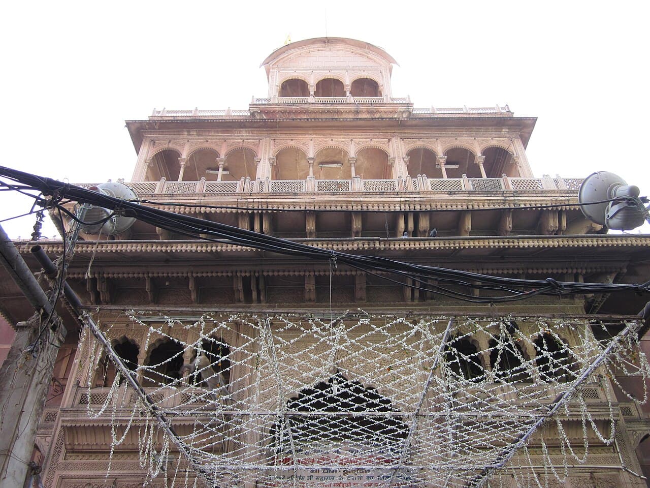 The upper storeys of the Banke Bihari Temple facade in Vrindavan