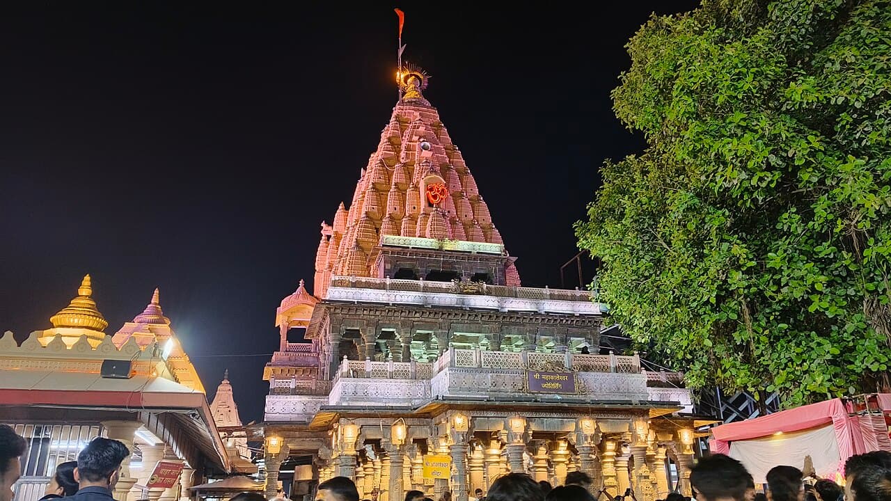 The illuminated shikhara of the Mahakaleshwar Temple in Ujjain at night